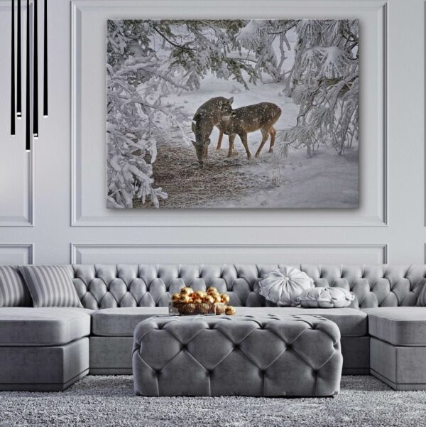 Deer couples in snowy winters canvas wall print