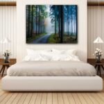 Forest Road pushing through Dense Mist and Pine Trees Canvas Art