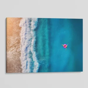 Woman Floating on a Warm Sea Beach